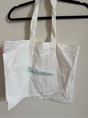 Réalisation Par White Canvas Tote with Teal Logo